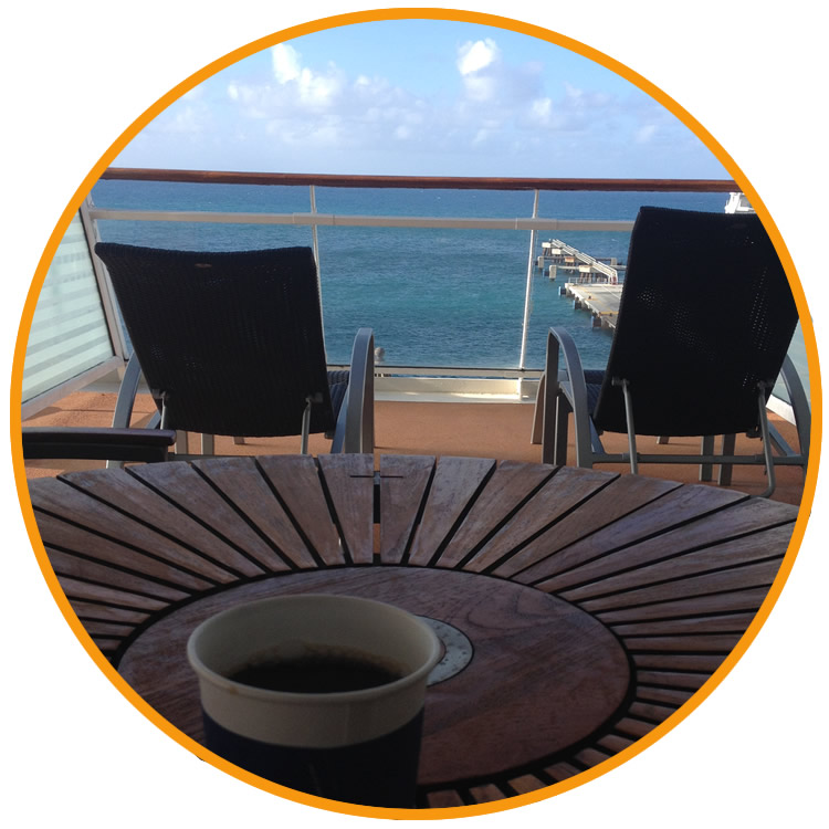 view from the cruise ship balcony looking out at the ocean